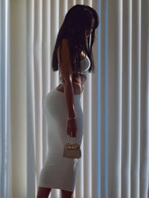 Ärmelloses, schmal geschnittenes Maxikleid